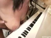 Natasha plays the piano 3/16