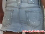 Two beautiful ladies in miniskirts on a couch 7/16