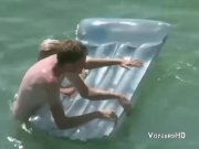 Voyeur films couple fucking in the water 12/16