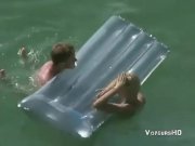 Voyeur films couple fucking in the water 9/16