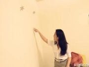 Sexy Asian MILF jerks a young man 1/16