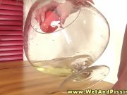 Piss fetish babe plays with urine 14/16