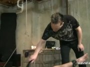 Blonde womens legs are spread wide by rope 7/16