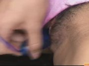 Lovely brunette babe plugging her cunt with a 10/16