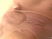 Brunette playing naughty thru her pantyhose 12/16