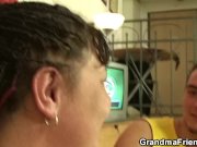 Plump mommy takes two young cocks 1/16