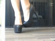 Capri Cavanni in her high heels  3/16