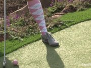 Busty babe Taylor plays a sexy round of golf 2/16