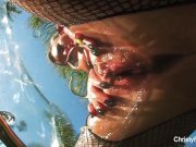 Christy oils herself up & teases the camera 15/16