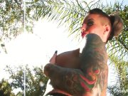 Christy oils herself up & teases the camera 9/16