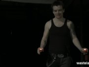 Brunette sex slave chained to pallet 1/16