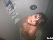 Brunette babe Charley takes a sexy shower 9/16