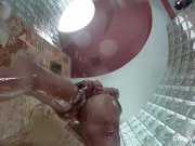 Christy showers off her perfect body