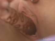 Glass dildo being used by a busty babe 4/16