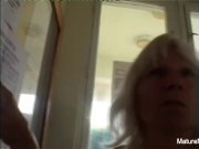 Blonde grandma gets some cum on her glasses 1/16