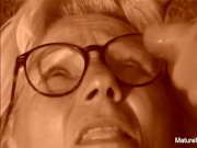Blonde grandma gets some cum on her glasses 15/16