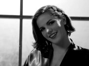 Bobbi masturbates in a corset and stockings 4/16