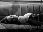 Bobbi masturbates in a corset and stockings 8/16