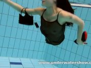 Brunette Kristy is stripping underwater 1/16
