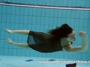 Brunette Kristy is stripping underwater 4/16