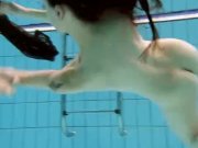 Brunette Kristy is stripping underwater 7/16