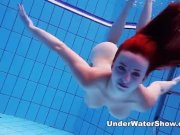 Underwater Show - redheaded cutie swimming nude in the pool 14/16