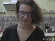 Solo girl with glasses chatting in the kitchen 11/16