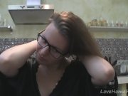 Solo girl with glasses chatting in the kitchen 14/16