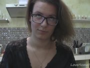 Solo girl with glasses chatting in the kitchen 4/16