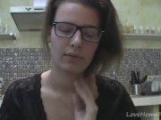 Solo girl with glasses chatting in the kitchen 6/16