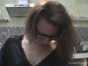 Solo girl with glasses chatting in the kitchen 9/16