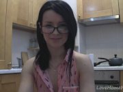 Splendid teen with glasses chatting in the kitchen 10/16