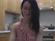 Splendid teen with glasses chatting in the kitchen 4/16