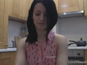 Splendid teen with glasses chatting in the kitchen 5/16