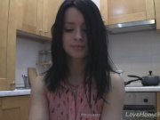 Splendid teen with glasses chatting in the kitchen 6/16