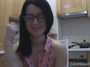Splendid teen with glasses chatting in the kitchen 8/16