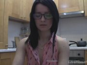 Splendid teen with glasses chatting in the kitchen 9/16