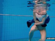 Teen girl Avenna is swimming in the pool 11/16