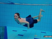 Teen girl Avenna is swimming in the pool 6/16