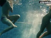 Two sexy amateurs showing their bodies off under water 10/16