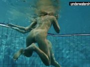 Two sexy amateurs showing their bodies off under water 13/16