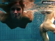 Two sexy amateurs showing their bodies off under water 15/16