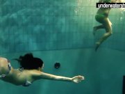 Two sexy amateurs showing their bodies off under water 3/16