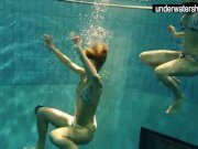 Two sexy amateurs showing their bodies off under water 5/16