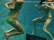 Two sexy amateurs showing their bodies off under water 6/16