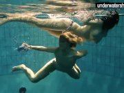 Two sexy amateurs showing their bodies off under water 9/16