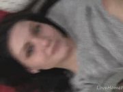 Girl in a gray shirt shows her tits