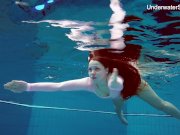 Redhead Simonna showing her body underwater 2/16