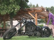 Biker girl showws off her desirable big tits 6/16