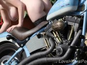 Cute blonde enjoys posing next to a bike 13/16